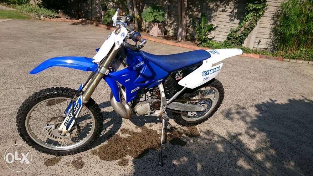 2009 YZ250 for sale with extra plastics and standard exhaust