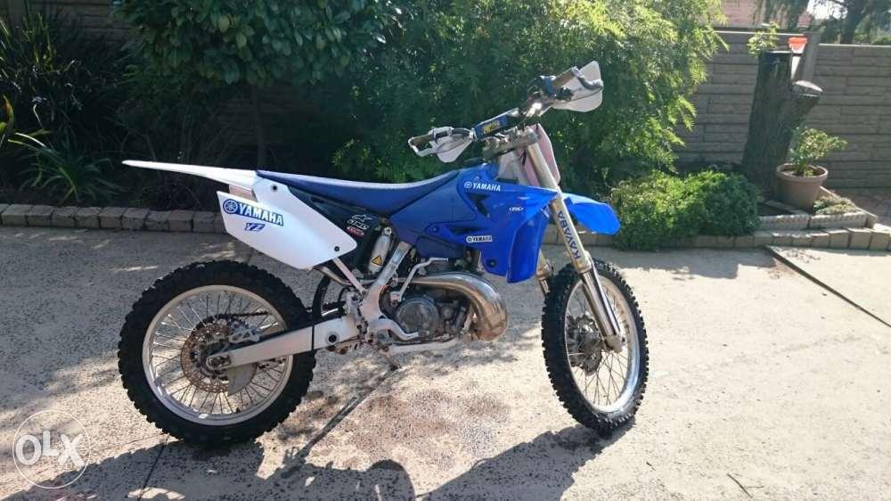 2009 YZ250 for sale with extra plastics and standard exhaust