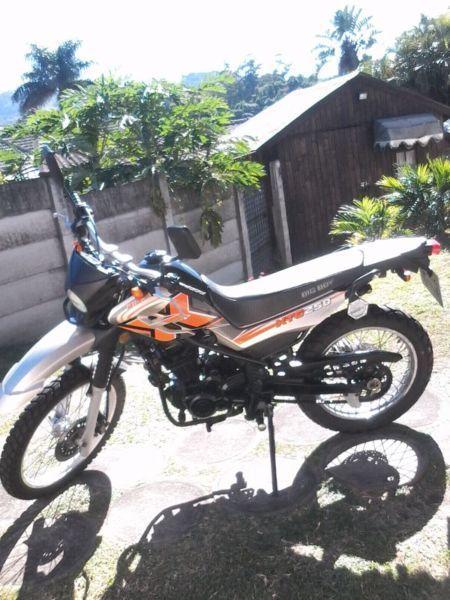 Big Boy motorbike with helmet and 2x off road tyres for sale