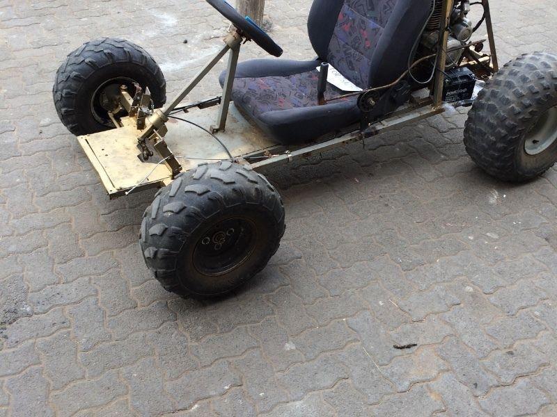 This is a custom built go kart. It has a 200cc motorbike engine . It is 5 speed manual.Not to miss