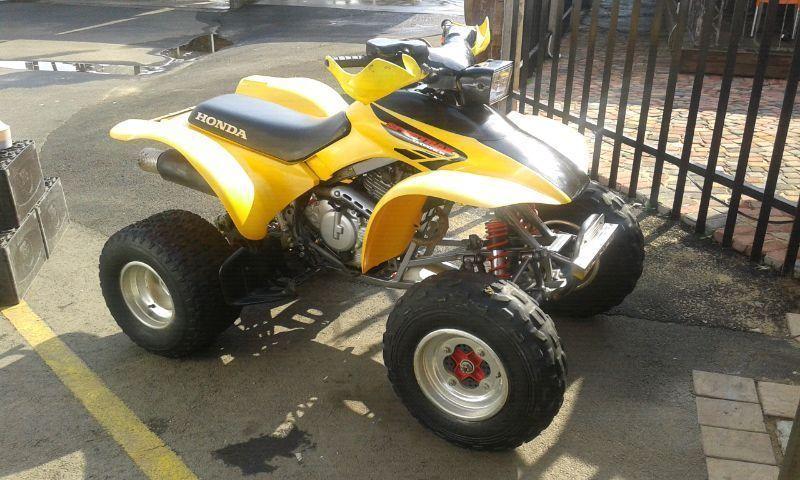 Lady owned Honda Sportrax 300
