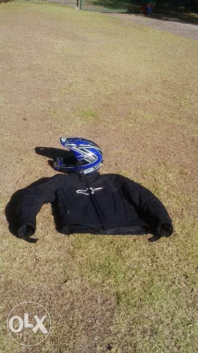 Alpinestar padded jacket and offroad motorcycle helmet