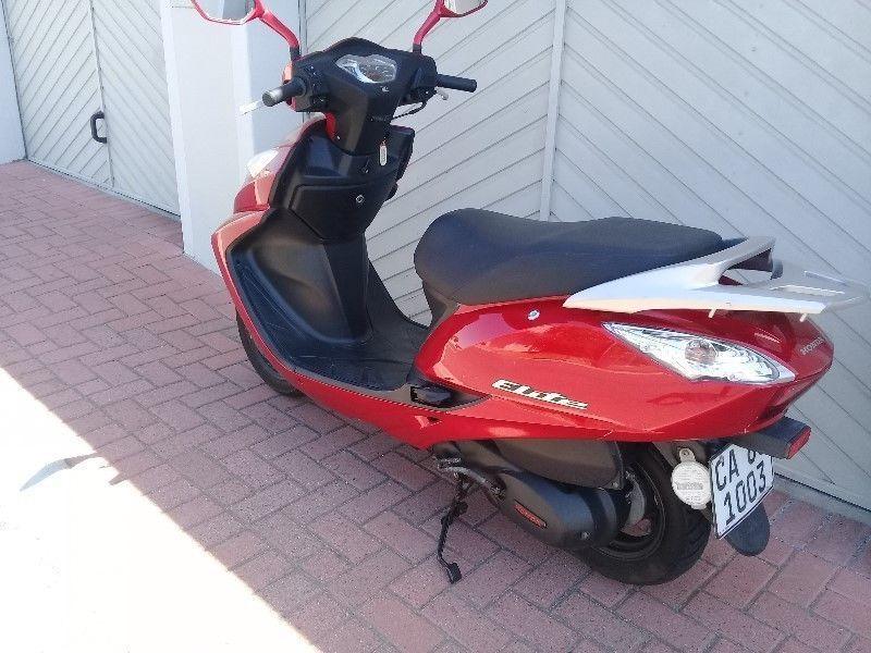 2014 Honda Elite 125cc automatic scooter, good condition/ service history, and spare key, and helmet