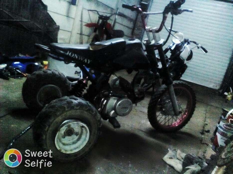 Honda cafe racer and 3 wheel pitbike for sale
