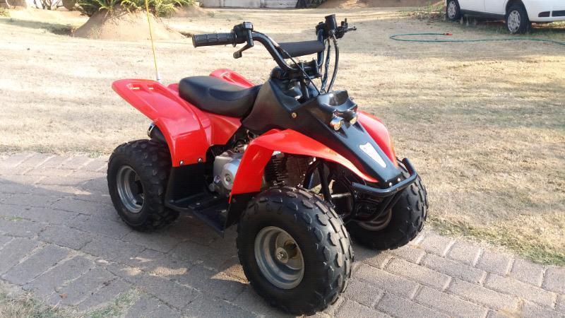 70cc automatic kids quad as new with helmet