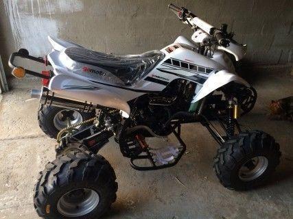 Quads - 50Km - Basically Brand New - 1x Pink/White, 1x Black/White