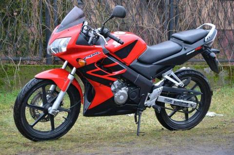 looking for cbr 125cc 9000 cash