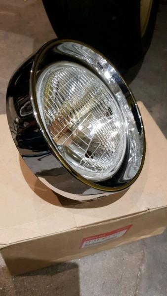 Honda headlight - brand new OEM - perfect for custom build or cafe racer 